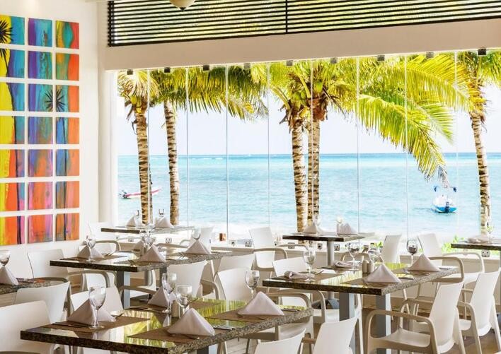 THE REEF COCO BEACH RESORT & SPA