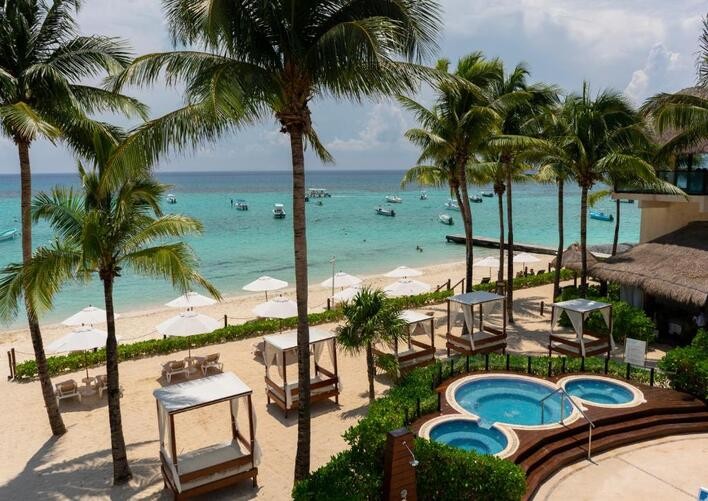 THE REEF COCO BEACH RESORT & SPA