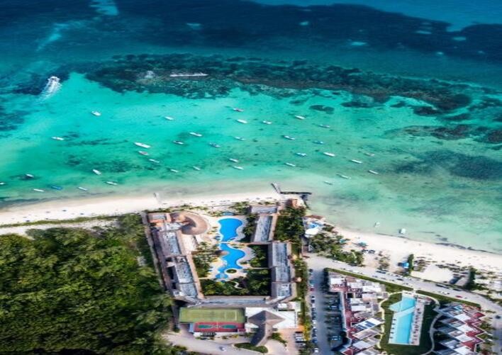 THE REEF COCO BEACH RESORT & SPA
